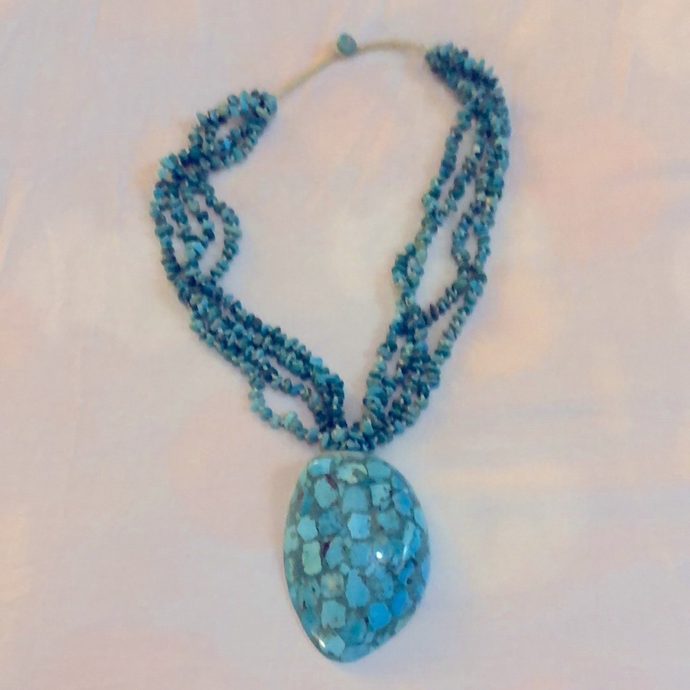 Turquoise and shell necklace - 22” around shell 3 1/4” long shell x 2 1/2” wide.
